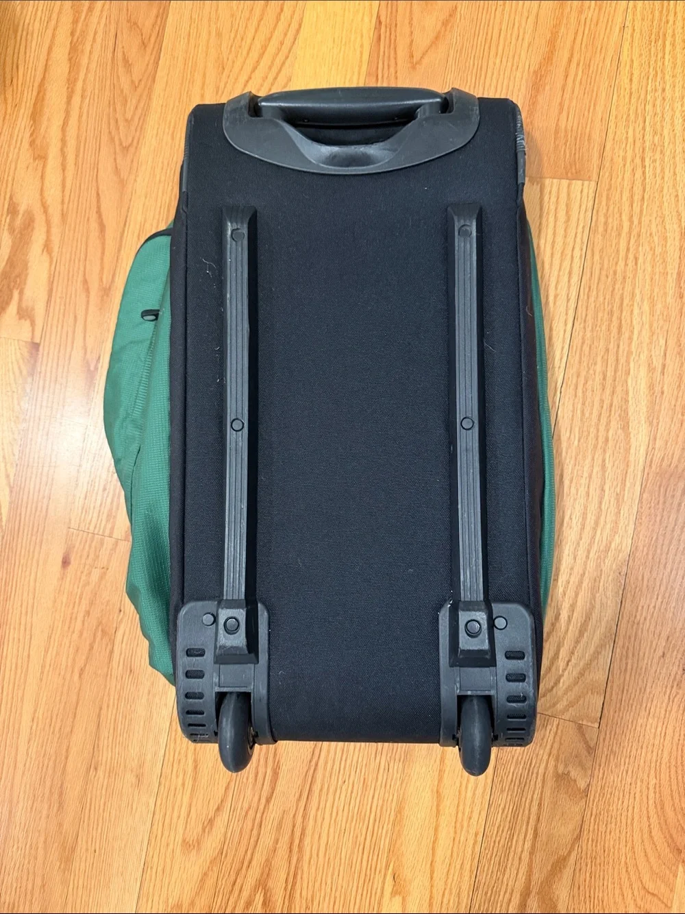L.L. Bean dark Green rolling Duffel Bag